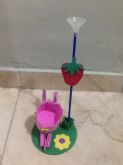 Carrinho de balas e bexiga.